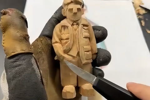 Front view of the figure with the clothes and hand-in-pocket pose defined.