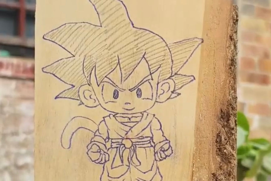 Young Goku reference drawing with a large head on a wood block