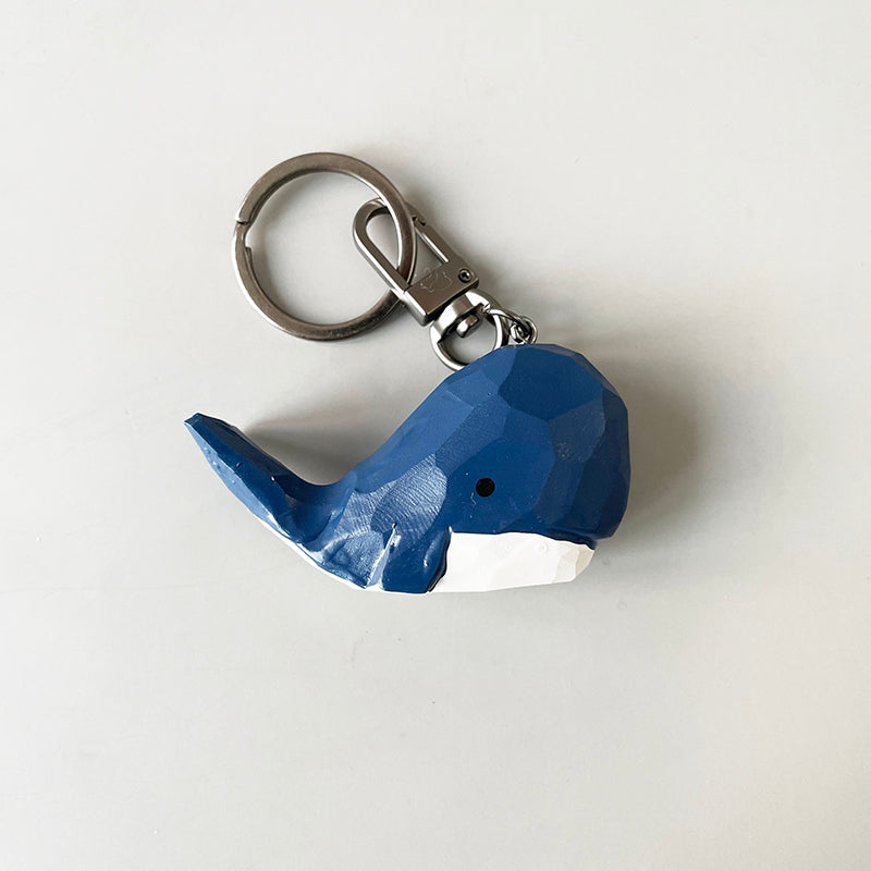Top view of the big head blue whale keychain, displaying the craftsmanship and color scheme.