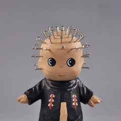 Close-up of chibi pinhead figurine face