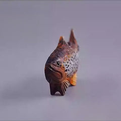 Wooden fish fridge magnet side view