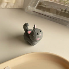 Gray mini cat figurine side view