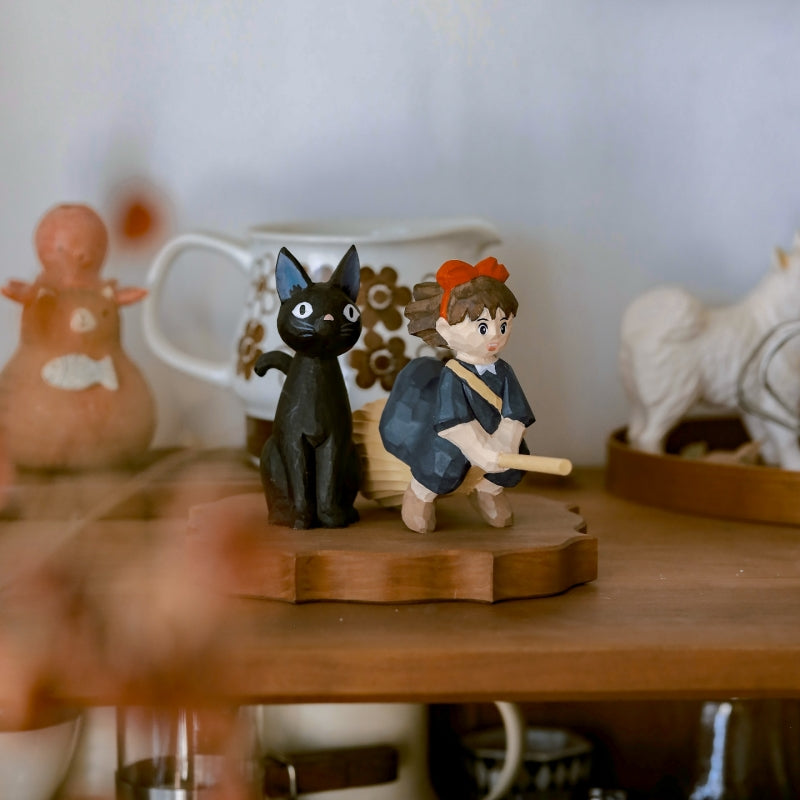 Kiki’s Delivery Service wooden figurines set on wooden shelf