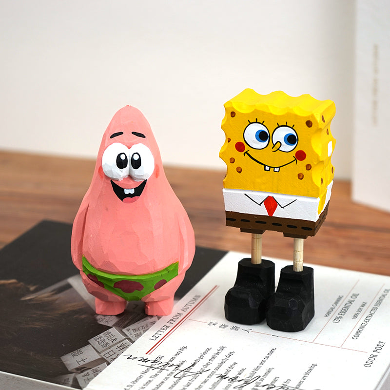 Hand-carved wooden Spongebob Squarepants figure standing next to Patrick Star.