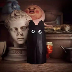 wooden black cat figurine display