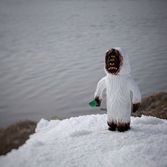 Yeti figure side view wooden figurine