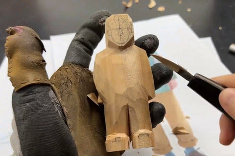 Front view of the figure after the main body masses are roughed out.