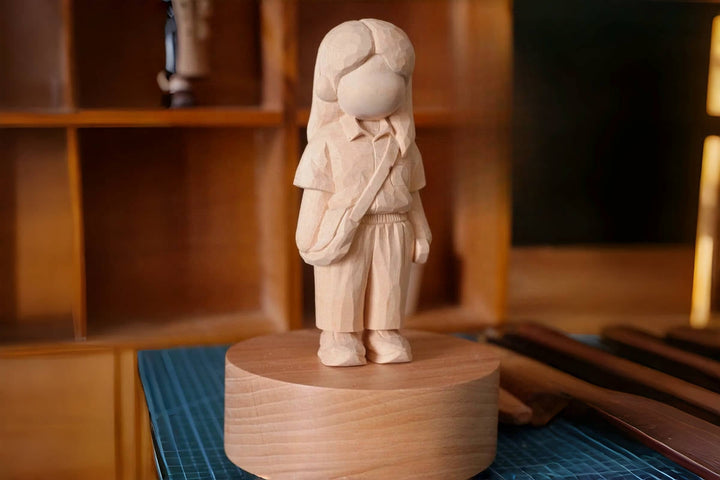 hand-carved wooden figure gift in progress