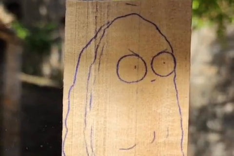 Wall-Nut’s front outline and eyes drawn on basswood