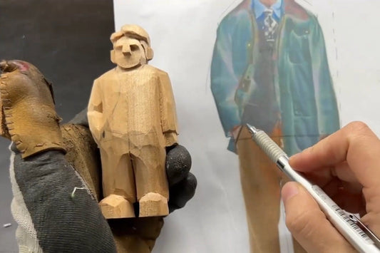 Carving detailed clothing and arm structure on a wooden figurine using a reference photo for wooden gifts tutorial