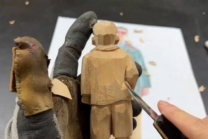 Carving the back waistline of a wooden figurine to enhance body structure, a key technique in crafting balanced wooden gifts.