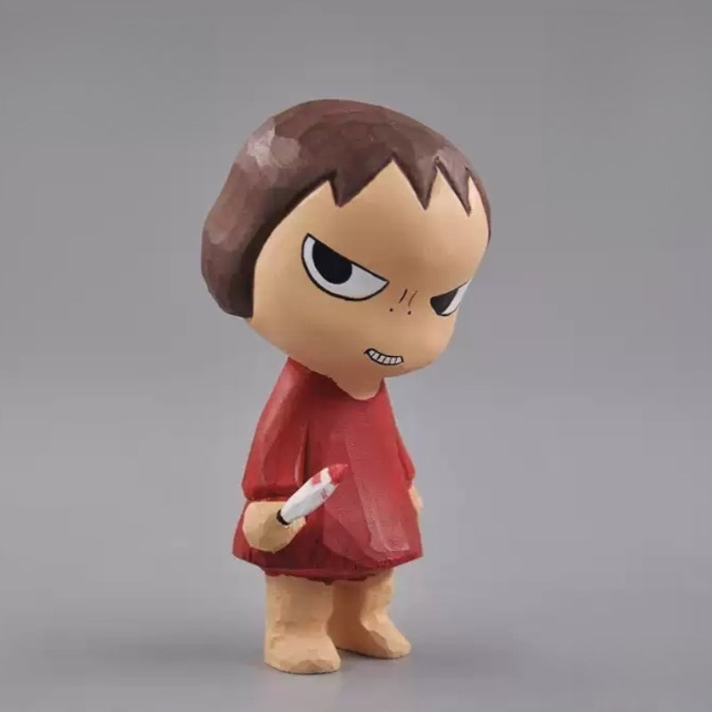 Angry girl wooden figurine front view with knife