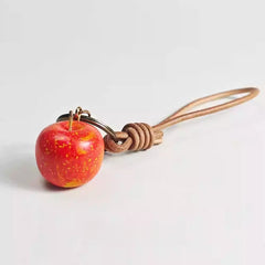 Apple wooden keychain side view