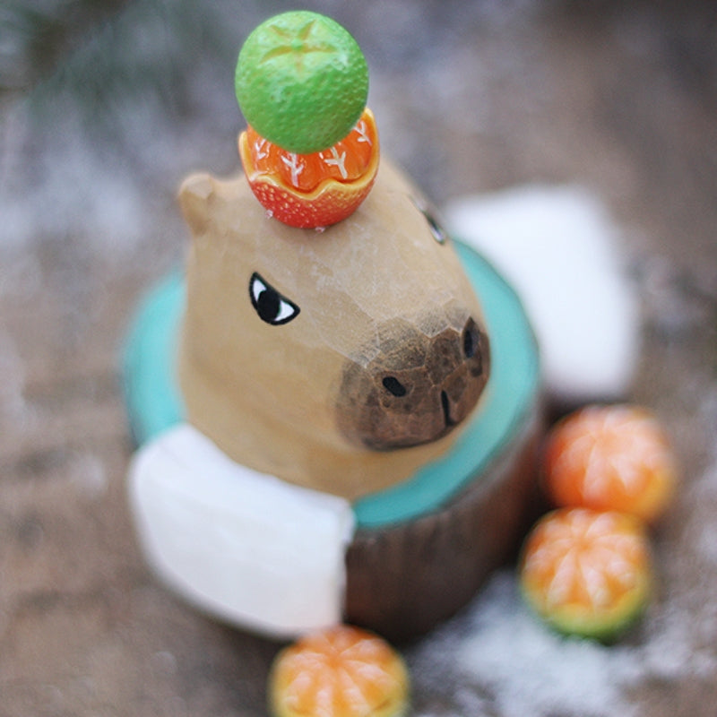Top view of a bubble bath styled capybara figure