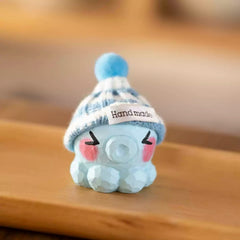 Blue octopus figurine with knit hat