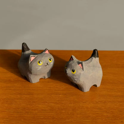 British shorthair figurine pair on table
