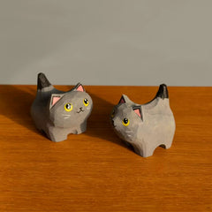 British shorthair figurine pair on table