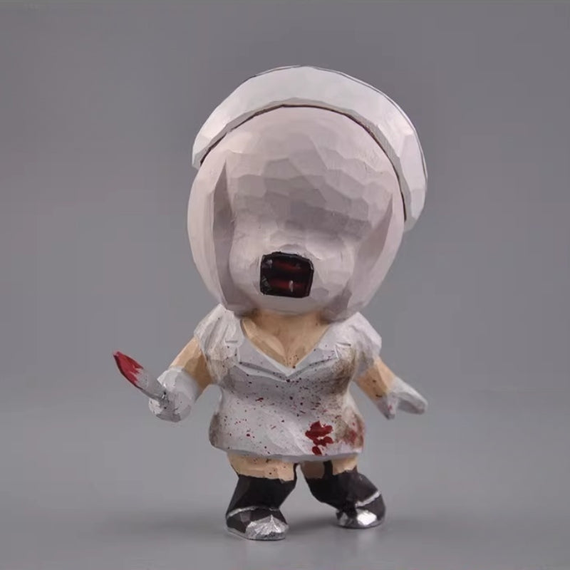 Wooden Silent Hill nurse figure with an oversized head and stained white uniform, front view