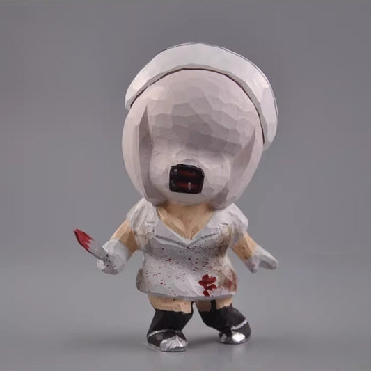Wooden Silent Hill nurse figure with an oversized head and stained white uniform, front view