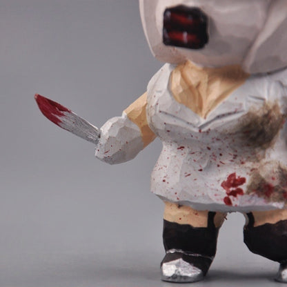 Bubble Head Nurse figure with red paint on the fixed knife and white uniform, close-up