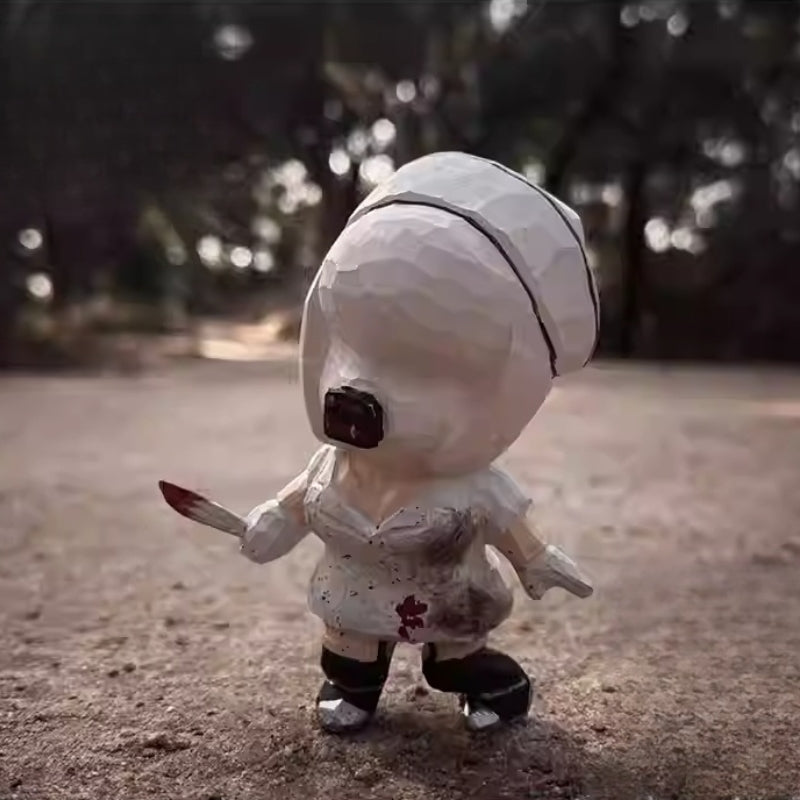 Bubble head nurse wooden figurine displayed on outdoor ground surface