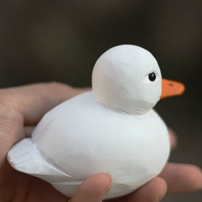 Call Duck figurine held in one hand to show its rounded size