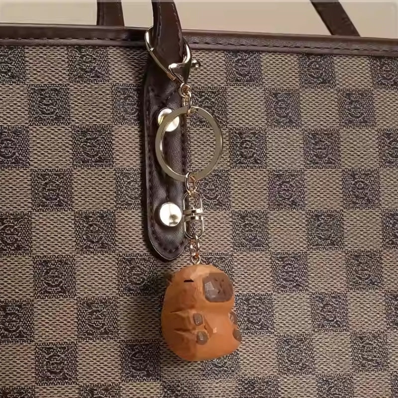 Capybara wooden keychain on bag