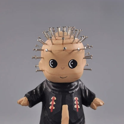 Close-up of chibi pinhead figurine face