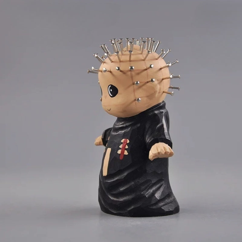 Side view of chibi pinhead figurine