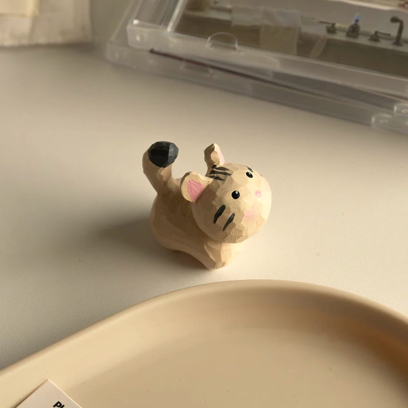 Cream tabby mini cat figurine with lifted tail