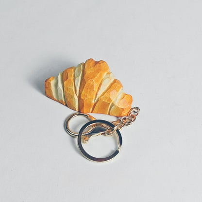 Wooden croissant keychain with metal ring