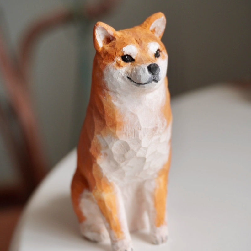 Custom wooden dog figurine of a smiling Shiba Inu, hand-carved from linden wood with warm, rustic texture.
