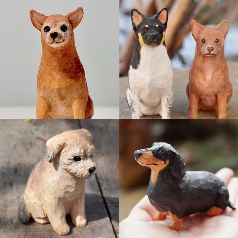 Diverse set of handcrafted custom dog sculptures, each carefully carved and painted to reflect pet likeness.