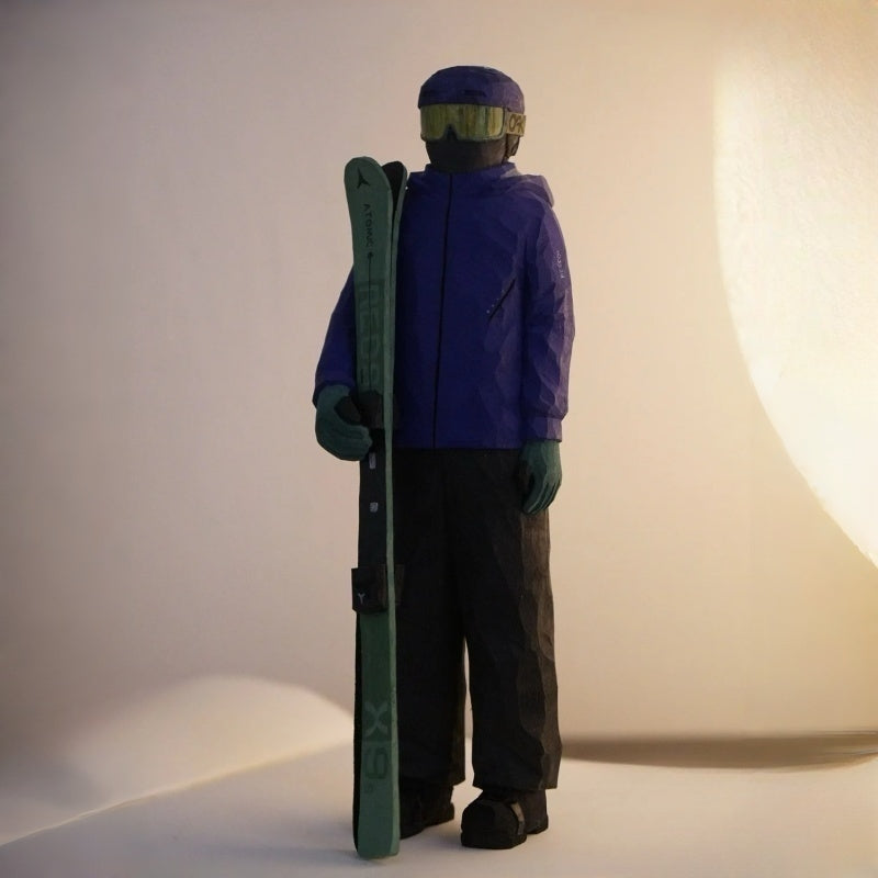 Hand carved wooden ski figurine holding skis, personalized skier sculpture from customer photo