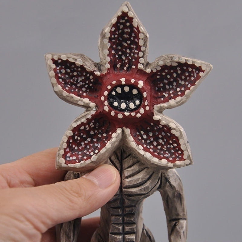 Close-up of Demogorgon figure’s flower-shaped mouth, highlighting detailed carving and paintwork.