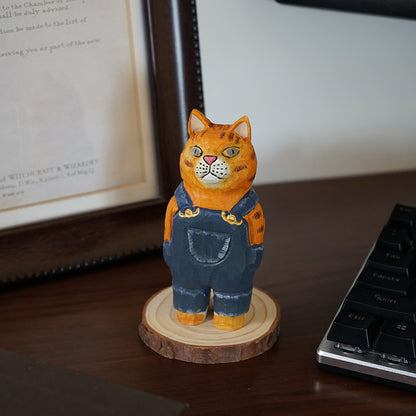 Close-up of denim cat sculpture, hand-painted wooden Figure