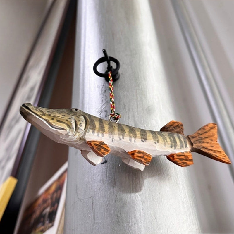 wooden fish ornaments hanging as decorative display