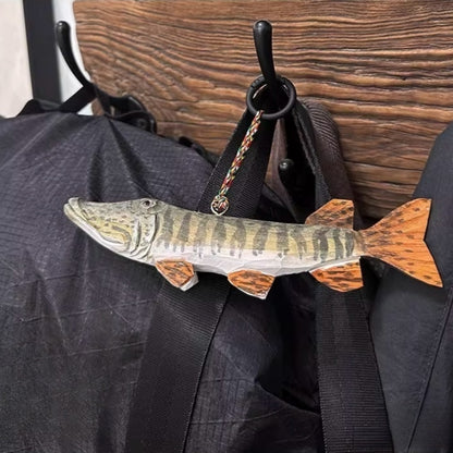 wooden fish ornament used as hanging decor
