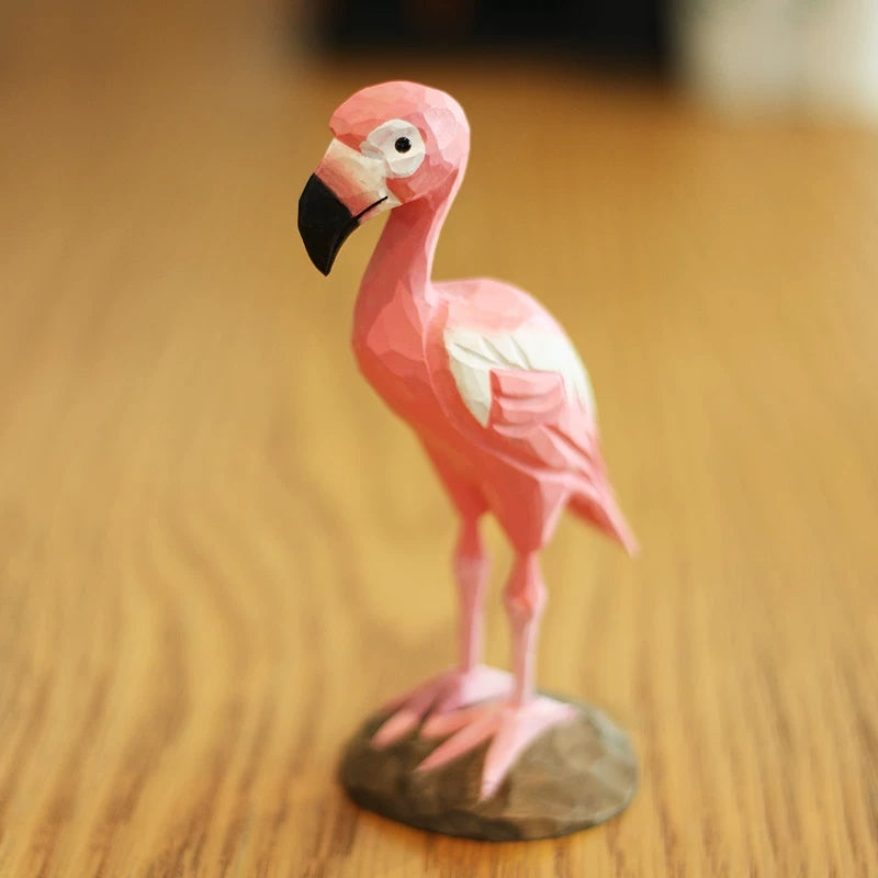 Flamingo wood carving with curved neck and carved wooden base