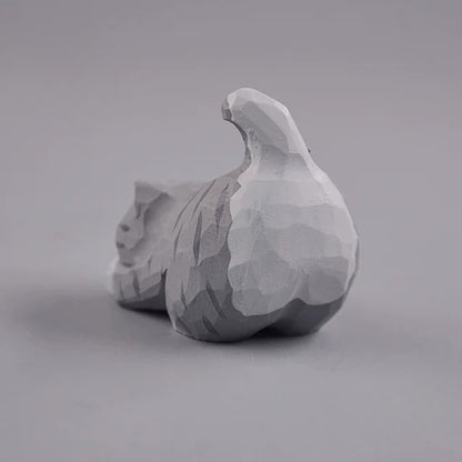 Gray cat figurine rear view with tail up
