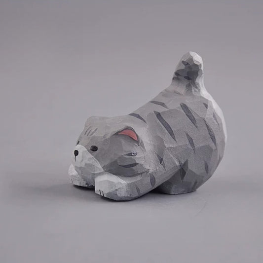 Gray cat figurine side view with raised tail