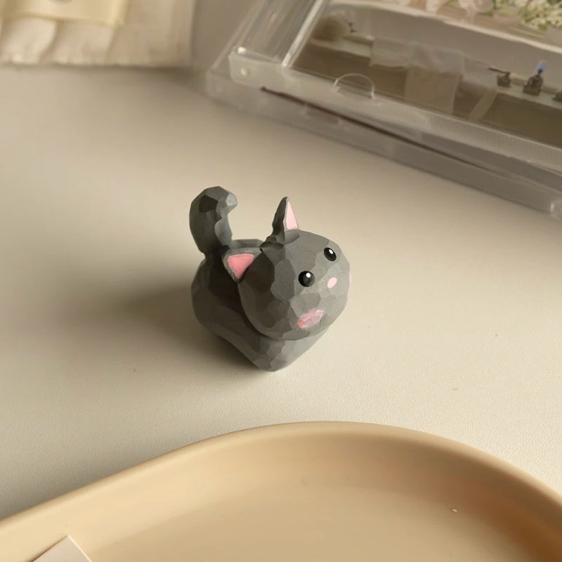 Gray mini cat figurine side view