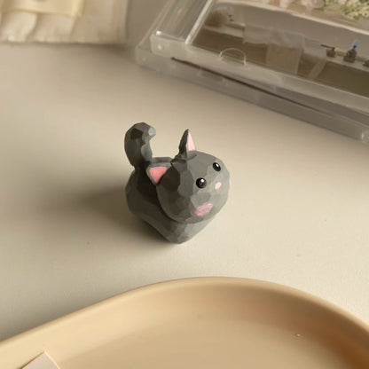 Gray mini cat figurine side view
