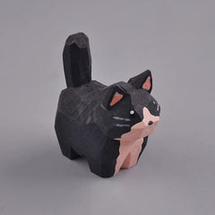 Hand carved tuxedo cat figurine back view