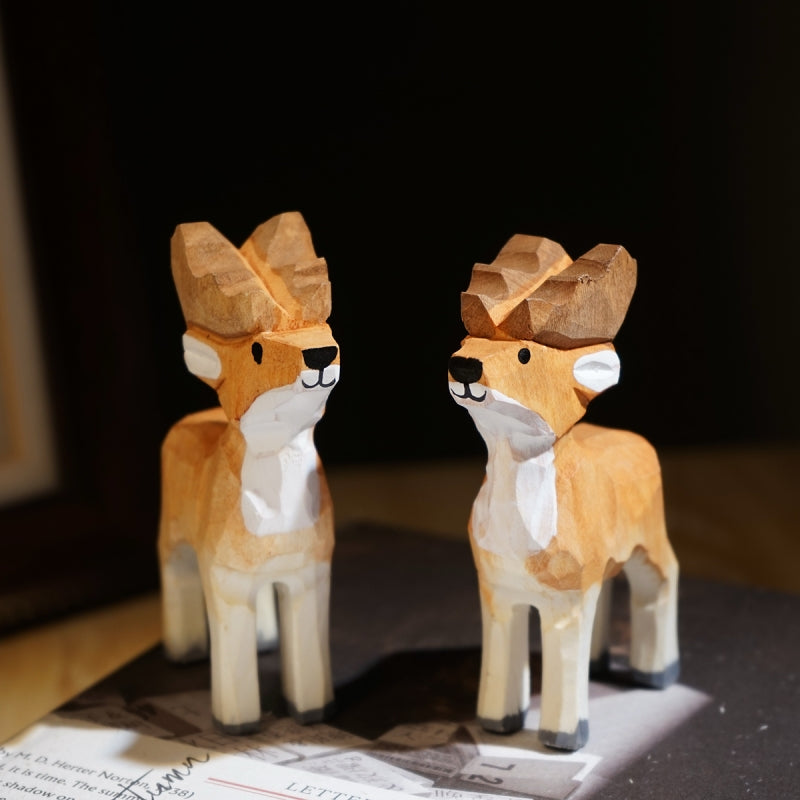Hand-Carved Wooden Reindeer Figurines for Christmas