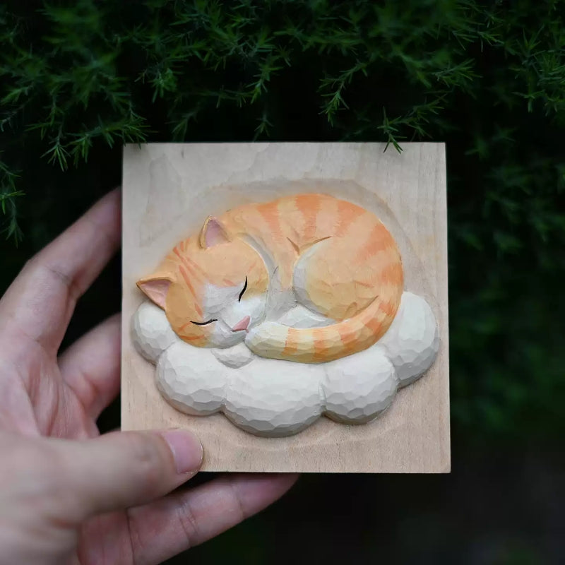 Hand held sleeping cat cloud wood carving