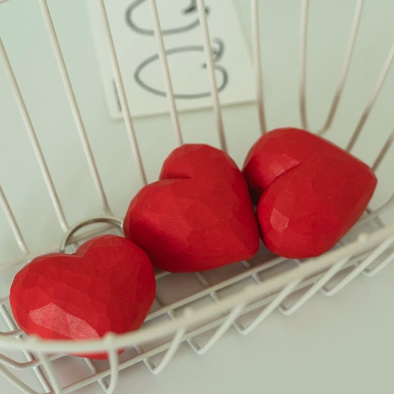 Red heart keychains in basket
