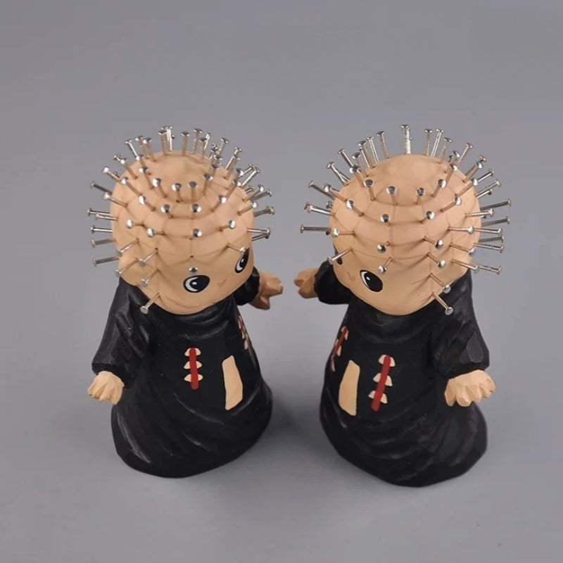 Pair of hellraiser pinhead wooden figurines