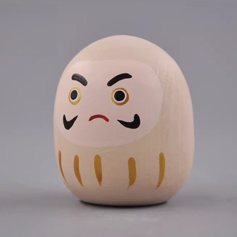 ivory-daruma-doll-side-view