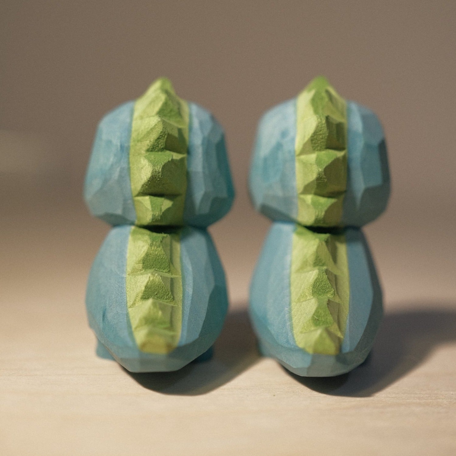 Back view of the dinosaur figures.